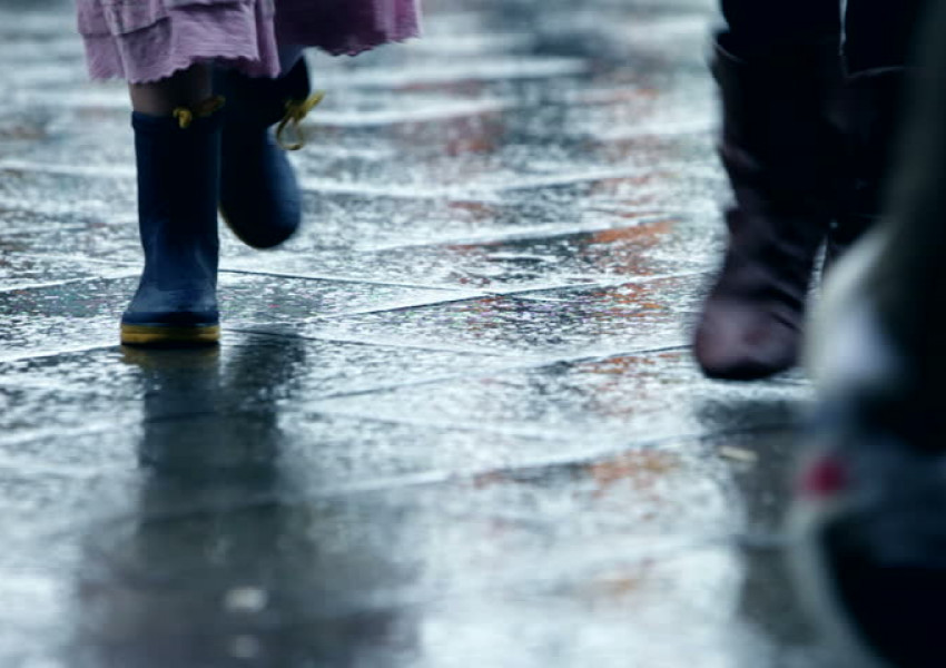 Greg enjoys in the rain walk walking